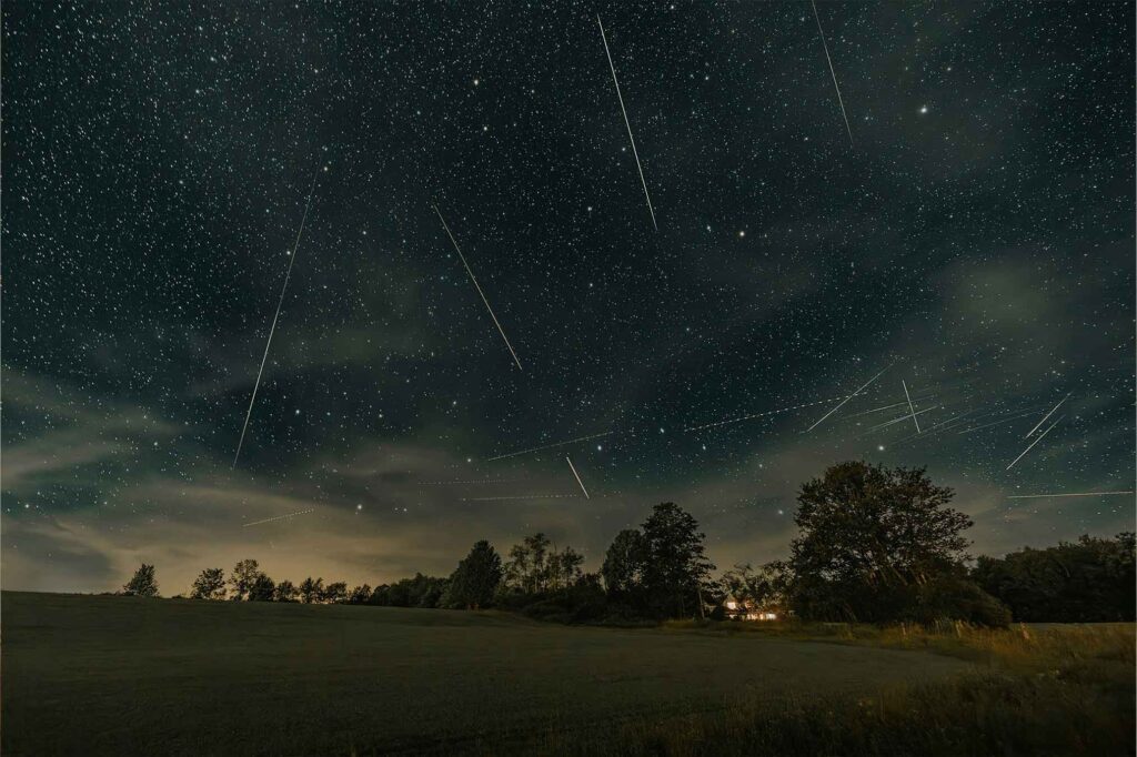 Rural farmland at night viewing the stars in Dufferin County, Ontario — where town and country meet