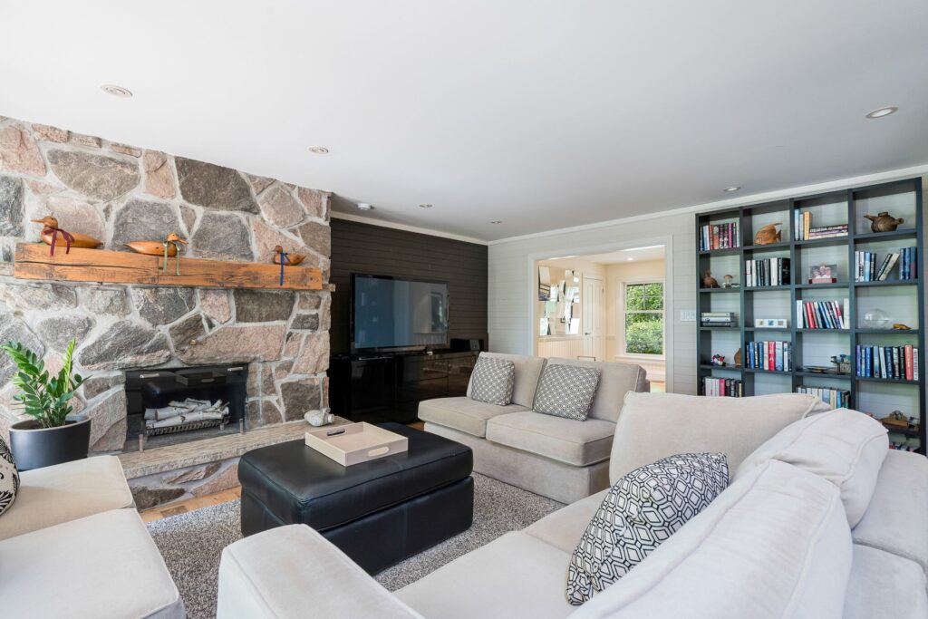 Mulmur bungalow for sale living room with stone fireplace
